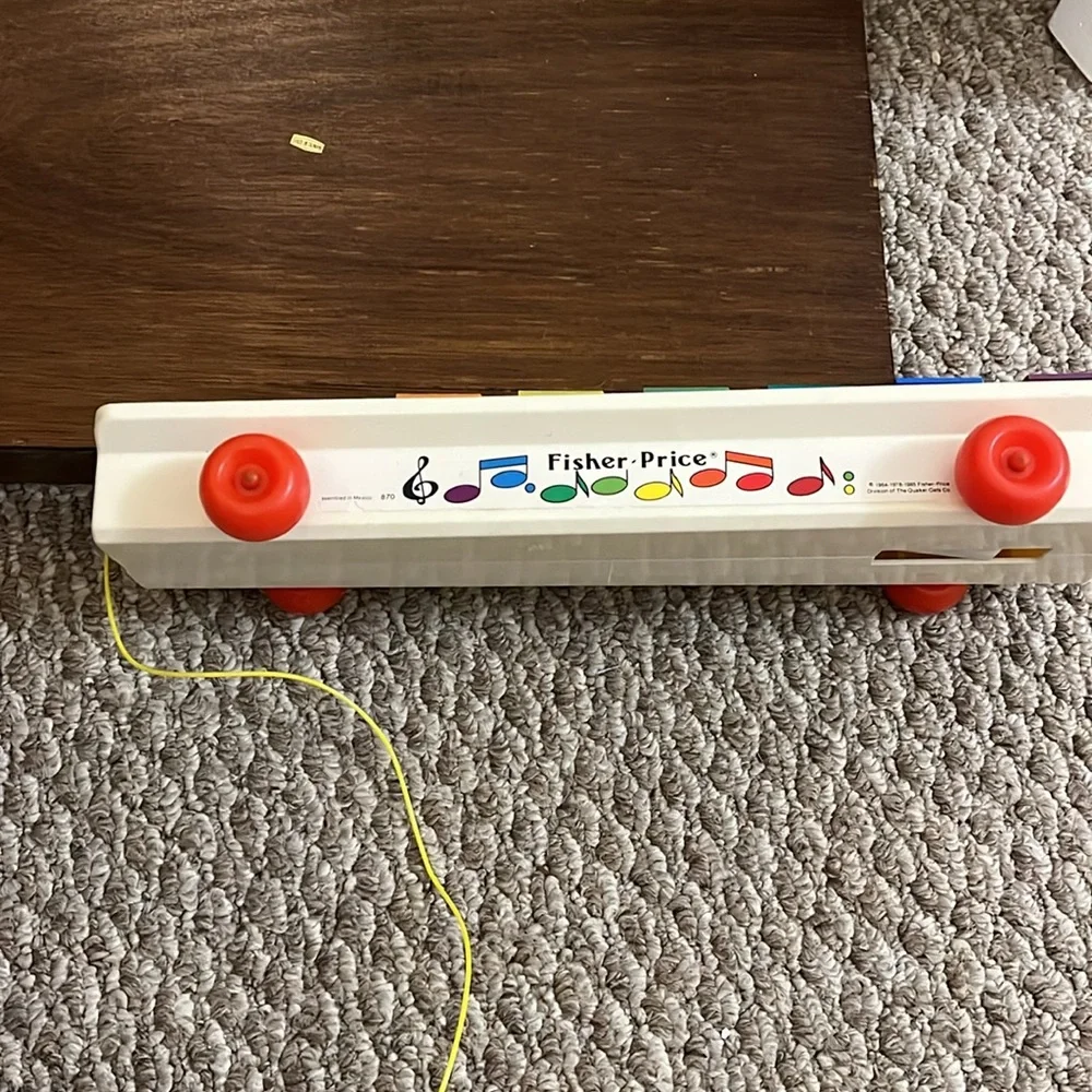 Fisher-Price Rainbow Xylophone Toy with Red Wheels